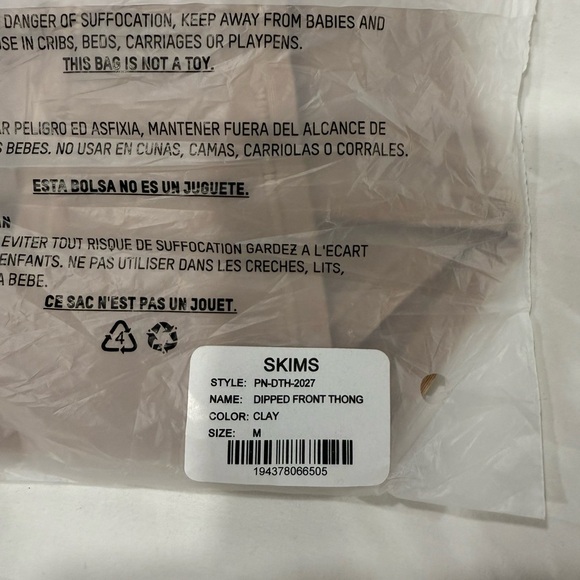 - SKIMS DIPPED FRONT THONG IN COLOR CLAY SZ M - Picture 11 of 11